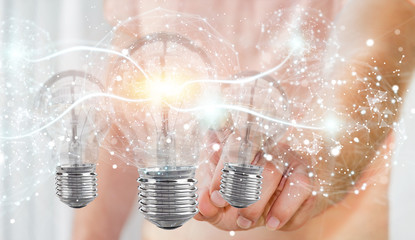 Aufkleber - Businessman connecting modern lightbulbs with connections 3D rendering