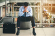© Fluky - Business man failed to feeling hopeless, distraught, sad and discouraged in life. Concept there are mistakes in travel and businessplanning.