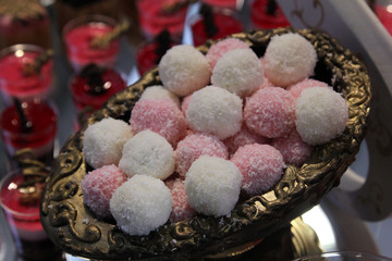 Colorful desserts and pastry served on a wedding party