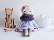 Handmade rag doll with white hair, wearing lovely dress and wool scarf
