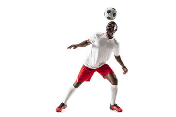 Wall Mural - Professional african american football soccer player in motion isolated on white studio background. Fit jumping man in action, jump, movement at game.