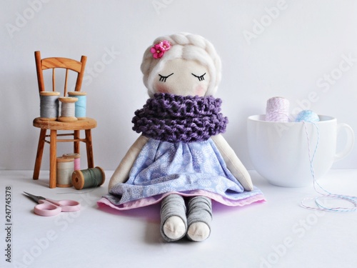 Handmade rag doll with white hair, wearing lovely dress and wool scarf Tableau sur Toile
