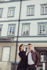 Wall Mural - Young hipster modern sexy couple in love hugging outdoors. Freedom, emotional, love, happiness concept