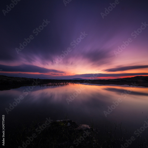 Fotografie, Tablou  Long exposure on night sky and small lake in area of Nordgruvefeltet in middle Norway