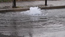 Footage Of Water Comming Out From A Road Drainage Due To A Ruptured Water Pipe Under The Ground...