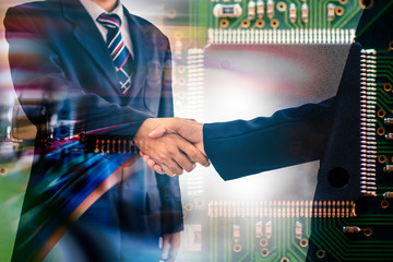 Two male executives have joined hands because of the two business cooperation agreements that have achieved success in the investment in the electronic technology and microchip industry.