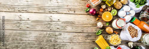 Fotografía Zero waste shopping and sustanable lifestyle concept, various farm organic vegetables, grains, pasta, eggs and fruits in reusable packaging supermarket bags