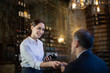 © ReeldealHD images - Waitress taking payment in a restaurant