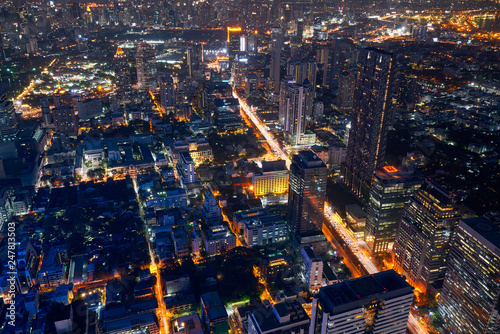 Cuadros en Lienzo ariel view of night cityscape in metropolis and beautiful lighting up