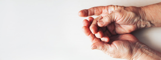 old woman hands on table top view space for text