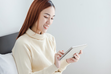 Wall Mural - Attractive business woman use computer tablet to see her online store