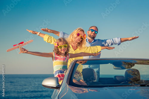Happy family travel by car