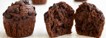Chocolate Muffins On White Wooden Table, Side View. Closeup.