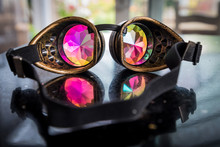 Festival Kaleidoscope Goggles Reflecting On Bench