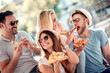 © ivanko80 - Group of friends eating pizza