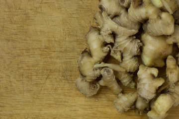 Wall Mural -  Ginger on wood plate for food content..