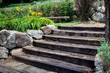 wooden stairs with boulders and golden flowers