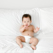 © Rawpixel.com - Cute Asian baby on a bed