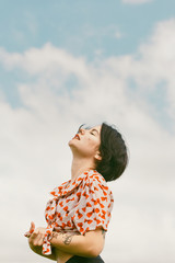 Wall Mural - woman dreaming of the clouds