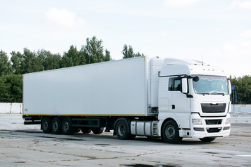 white truck with trailer