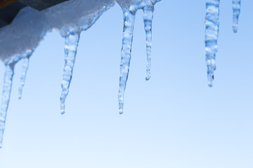 Icicles on building in winter