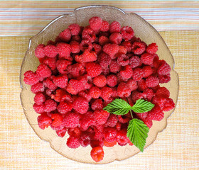 Fresh Raspberries background. Strawberry. Food background.Copy space. Top view, healthy food for breakfast. Eco, organic summer diet food. Ripe Raspberries from garden in a mug .Summer Raspberries . 