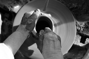 hands of a potter at work in Romania 