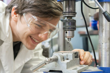 man worker using drill machine b