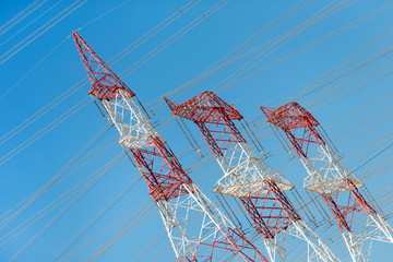 Electric power transmission lines, power line in the field in Ruwais region, United Arab Emirates