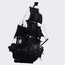 Black Pirate Ship Of The Eighteenth Century With Guns On White Background