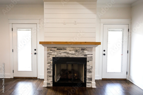 Modern Open Spacious Living Room With Tiled Fireplace And Custom