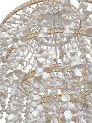 Close up view of the Chandelier made of thousand seashells on white background. 