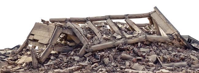 Collapsed and destroyed concrete industrial building isolated on white background. Disaster scene full of debris, dust and damaged house