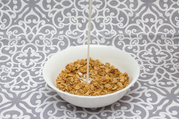 Granola, Oatmeal for breakfast. Oatmeal. Granola with milk, breakfast