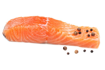 Red fish. Raw salmon fillet isolate on white background.