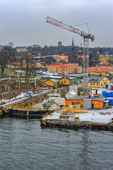 Wall Mural - Old wharf at Beckholmen, a small island in central Stockholm, Sweden.