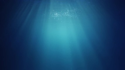 Poster - Underwater sunlight beams shining from above coming through the deep crystal clear blue water causing a beautiful water lighting reflections curtain