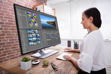 Poster - Female Editor Editing Video On Computer