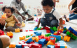 © Rawpixel.com - Diverse children enjoying playing with toys