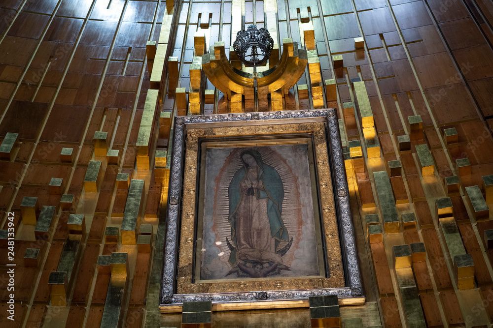 MEXICO CITY, MEXICO - JANUARY 30 2019 - Pilgrims at Guadalupe Cathedral - obrazy, fototapety, plakaty 