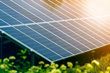 close-up surface of lit by sun modern saving efficient stand -alone blue shiny solar photo voltaic p