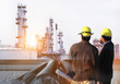 © sittinan - oil and chemical refinery with engineer working