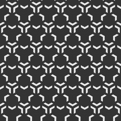 Abstract seamless pattern of triangular elements.