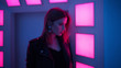 © Ulia Koltyrina - Beautiful girl in retro wave on the neon light