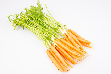 Fresh organic carrot vegetable with green leaves Healthy food isolated on white background