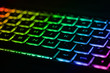 © Vitalii - Beautiful colorful modern keyboard with rainbow backlight. Backlight of the keyboard in different colors