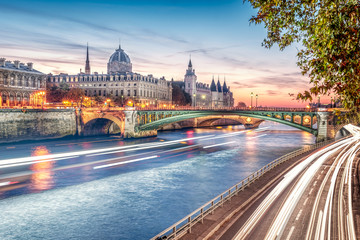 Wall Mural - Beautiful colors of Napoleon Bridge at dusk with Seine river - Paris, France.