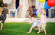 Little boy and girl having fun during celebrating birthday party