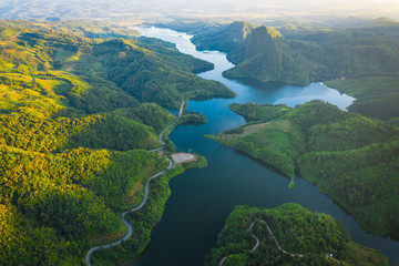 Wall Mural - national reservoir in the middle of the valley and the road connecting the city