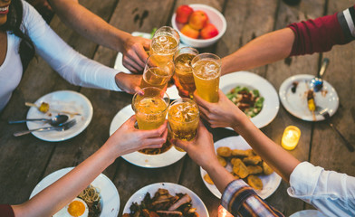 Wall Mural - People in asian are celebrating the festival they clink glasses beer and dinner happy